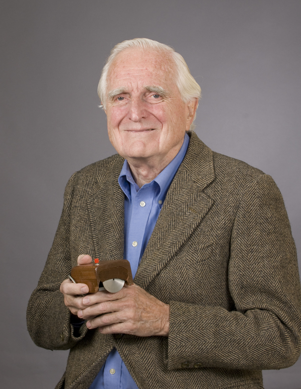 SRI’s Douglas Engelbart with the first computer mouse prototype